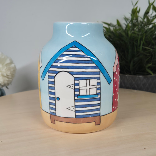 Traditional Beach Hut Vase, Bright Seaside Beach Scene, with nautical Flags.
Small Decorative Flower Jug, Hand painted, Glazed and Fired. Hold fresh, Dried or Artificial Flowers and Leaves Traditional Beach Hut Vase, Bright Seaside Beach Scene, with nautical Flags.
Small Decorative Flower Jug, Hand painted, Glazed and Fired. Hold fresh, Dried or Artificial Flowers and Leaves
