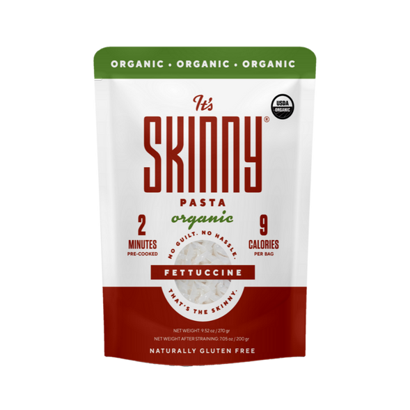 The front of a bag of It's Skinny Organic Fettuccine pasta is white and red with red text and a green "organic" label across the top.