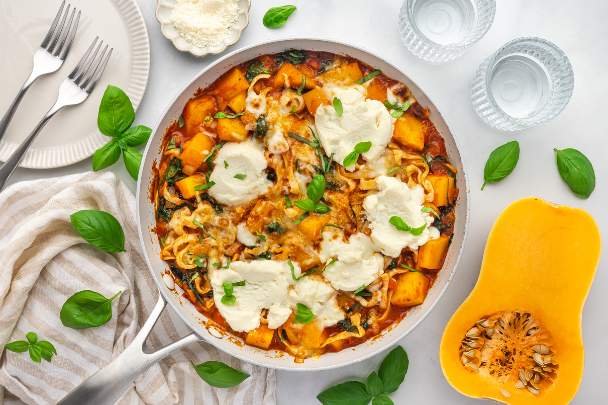 An overhead image of a skillet of deconstructed butternut squash lasagna.
