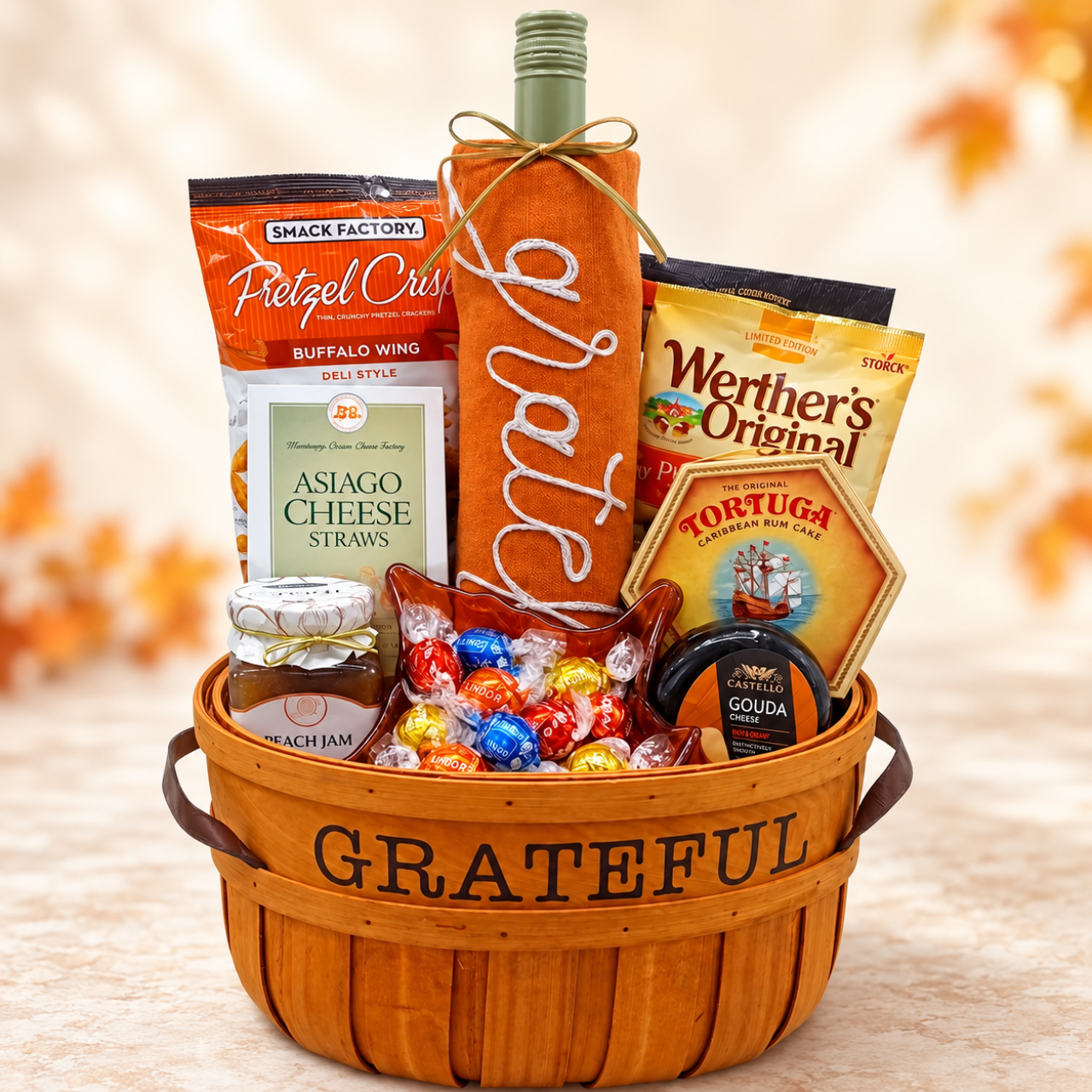 Grateful Gift Basket displayed in a bright autumn setting with fall leaves