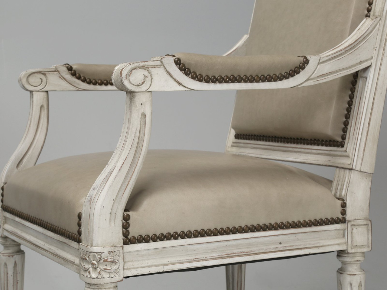 Custom French Louis XVI style arm chairs.