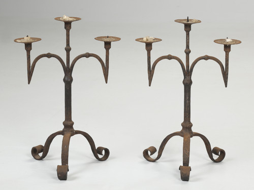 Antique Pair of French Wrought Iron Candlesticks front