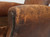 nternally Rebuilt French Leather Club Chair arm closeup detail