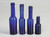 Collection of '15' Cobalt Blue Caster Oil Hand Blown Bottles Made in 1800s, United Kingdom 4 heights