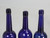 Collection of '15' Cobalt Blue Caster Oil Hand Blown Bottles Made in 1800s, United Kingdom 3 Tall Bottles Close up