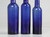 Collection of '15' Cobalt Blue Caster Oil Hand Blown Bottles Made in 1800s, United Kingdom 3 bottle heights bottom view
