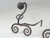 Wrought Iron Fireplace Andirons. Modernist Curled Form with Sphere Top c1940's