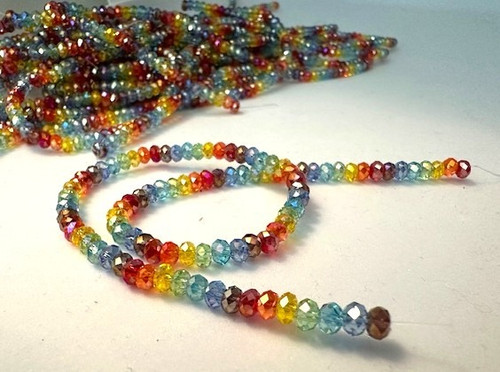 Rainbow Mini Rondelles AB 4x3mm.