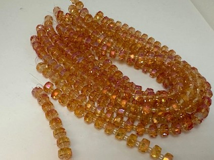 Chinese Glass Disc Rondelle in Peach AB. 8x4mm.