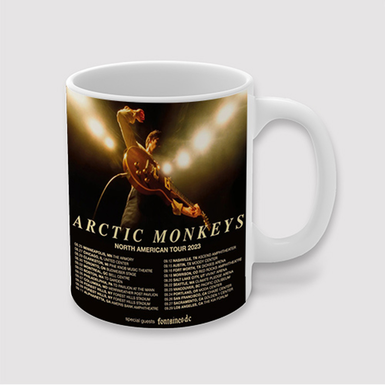 https://cdn11.bigcommerce.com/s-xhmrmcecz5/images/stencil/1280x1280/products/183161/188521/Arctic-Monkeys-2023-Tour-Custom-Ceramic-Mug__71810.1672641771.jpg?c=1