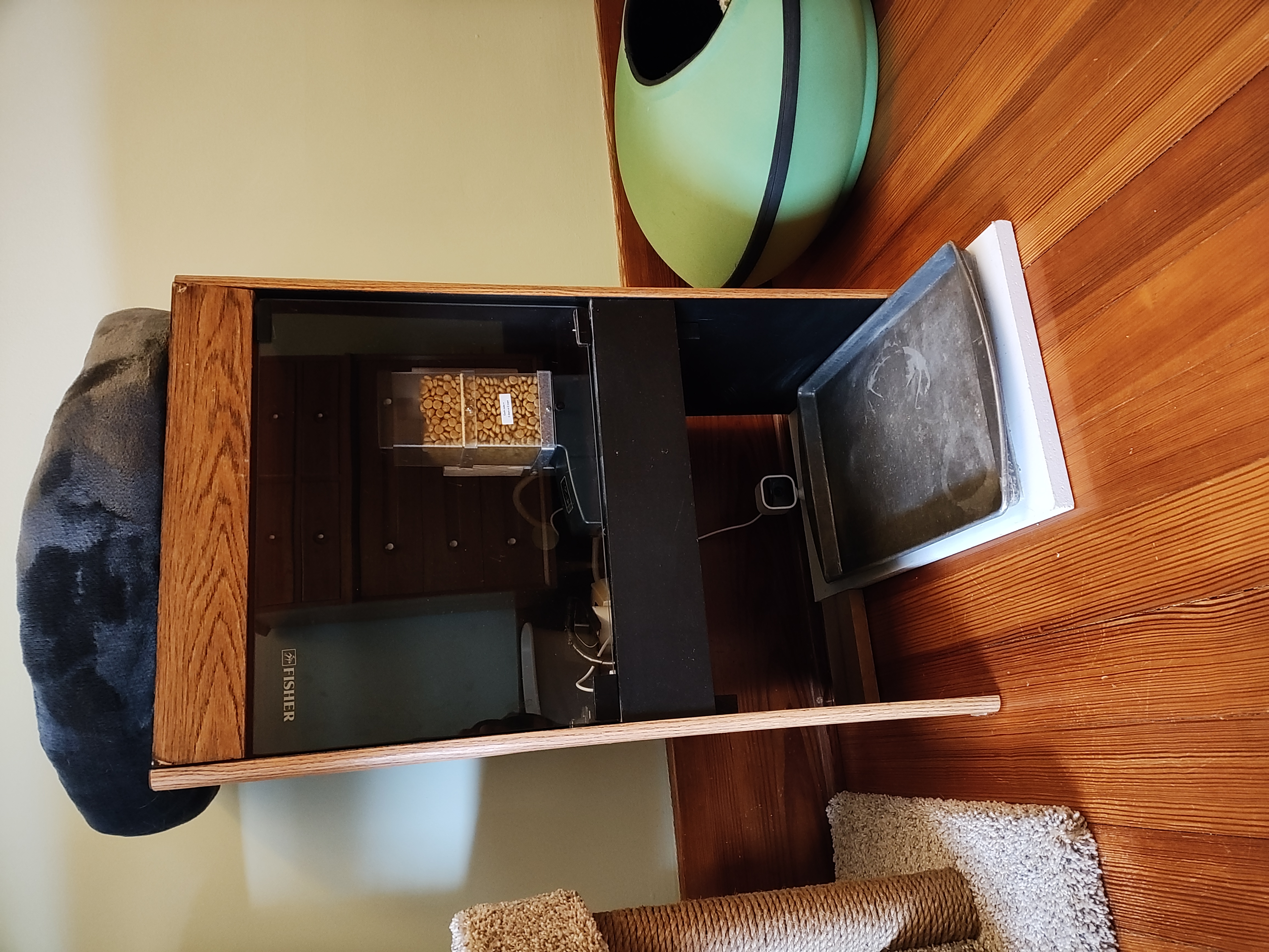 cat-feeder-in-old-stereo-cabinet.jpg