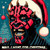 Darth Maul with a festive Santa hat, missing his two front teeth, surrounded by Christmas ornaments and decorations, with the playful text "MAUL I WANT FOR CHRISTMAS."