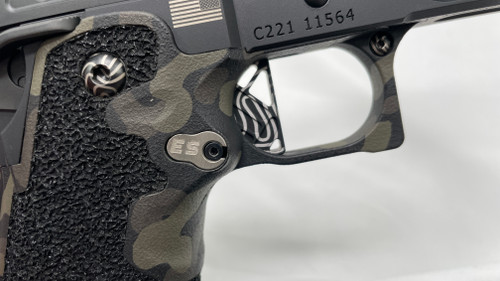 Head on photo of our extended/drilled and tapped gen 2 magazine release for Staccato C2, P, XL, XC in stainless PVD