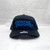 Front of Richardson 112 hat with blue Extreme Shooters embroidery.