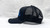 Side profile of the Richardson 112 black hat