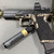 Pistol with red dot optic lubricated with APEX gun oil.