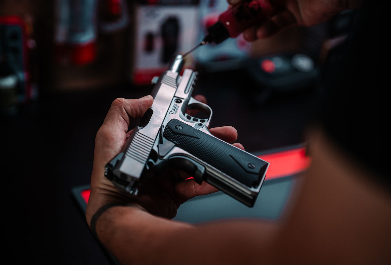 Lifestyle | 1911 Carry | two tone rail Carry in hand at the bench