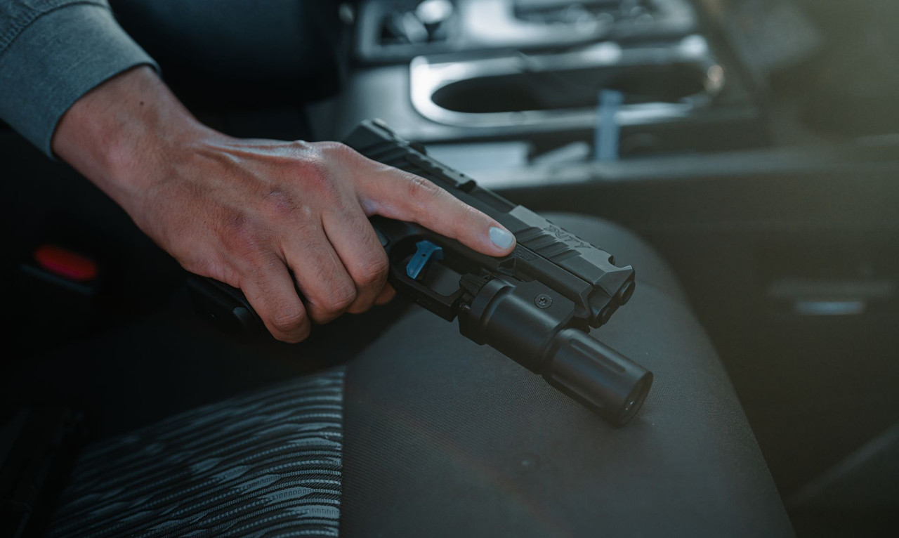 Lifestyle | PX-9 | Duty with a weapon light on the truck console