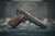 Lifestyle | 1911A1 US Army | propped on a bench with the seal behind