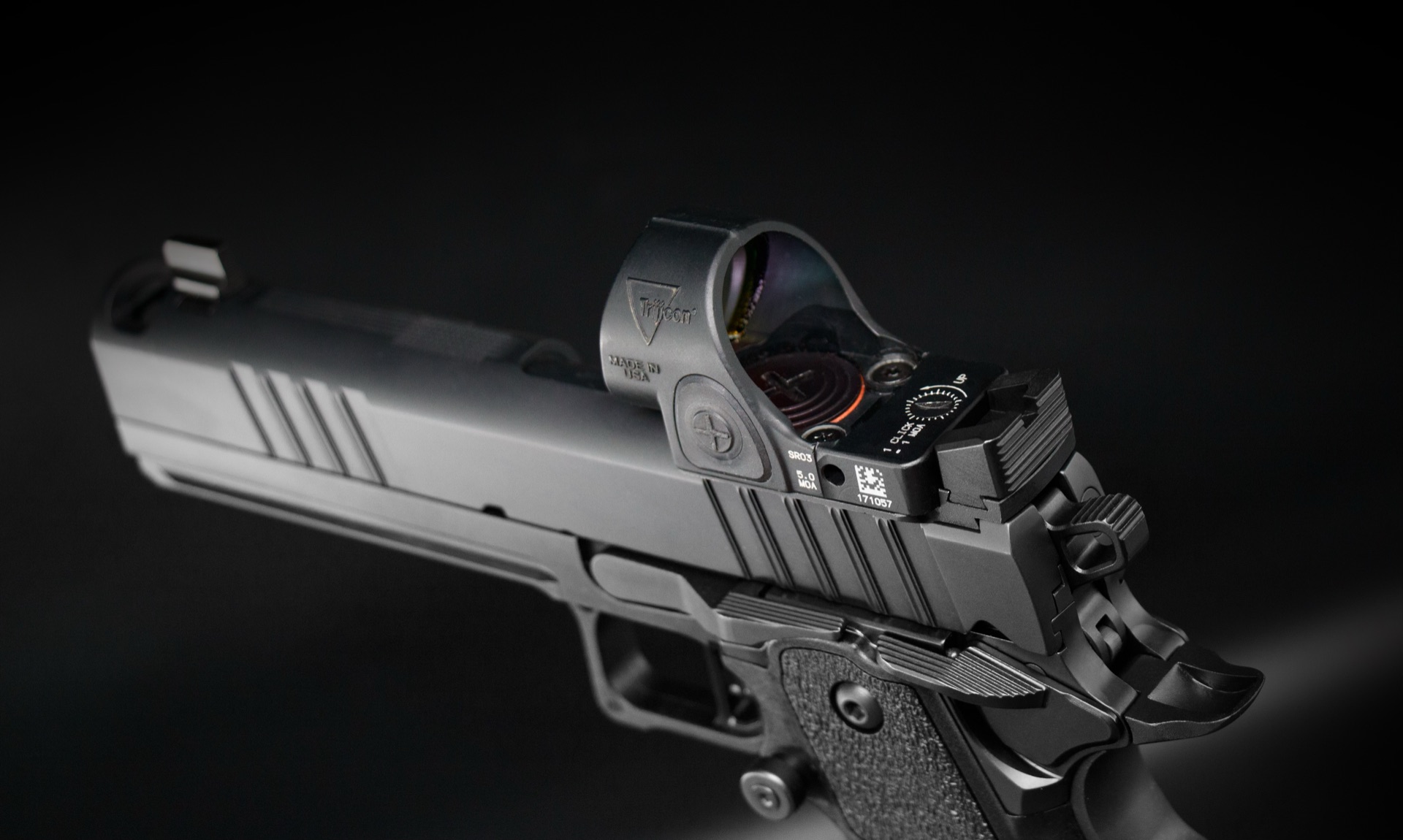 Tisas double stack 1911 with a Trijicon SRO red dot mounted on the factory optic cut