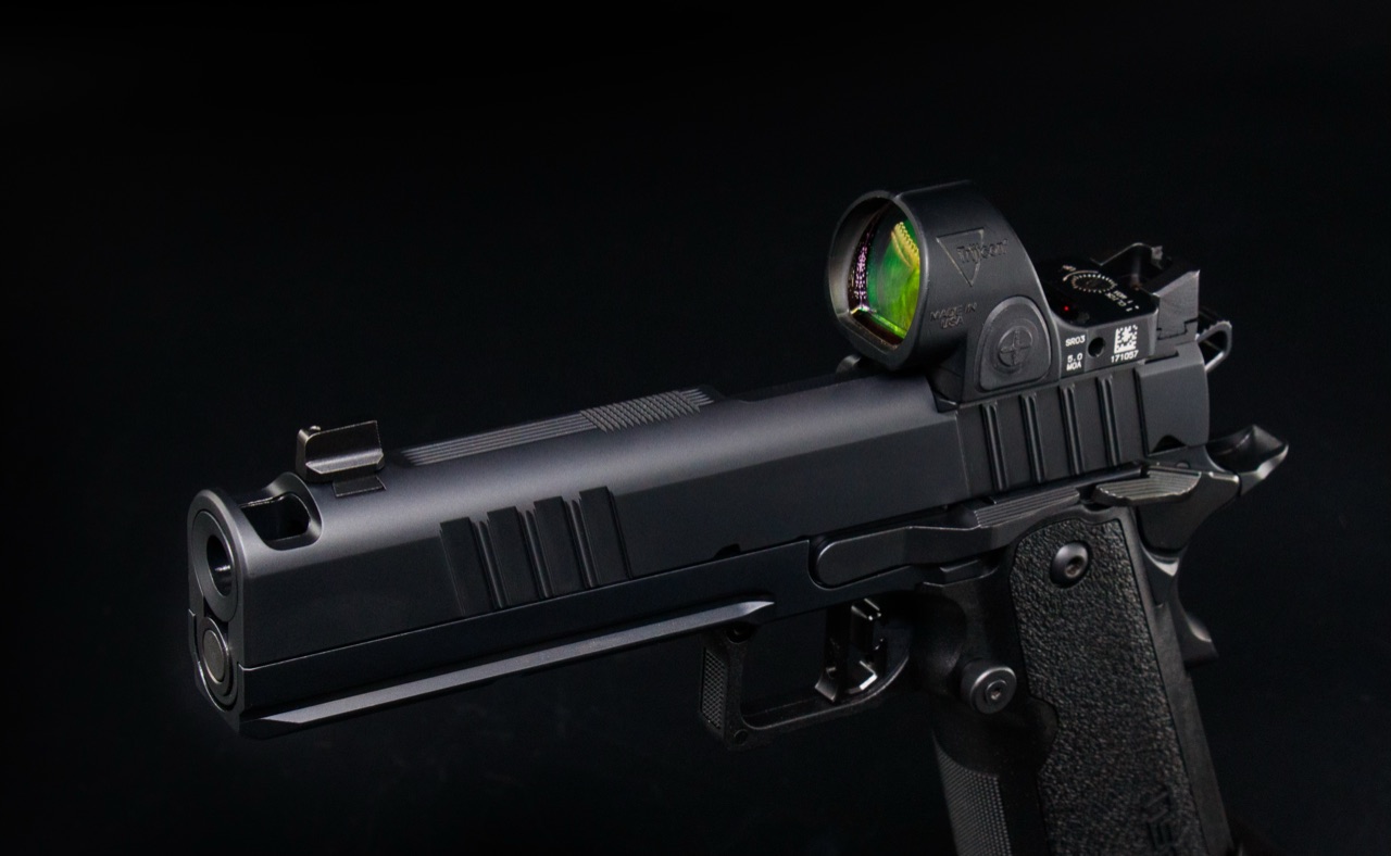 Tisas double stack 1911 with a Trijicon SRO red dot