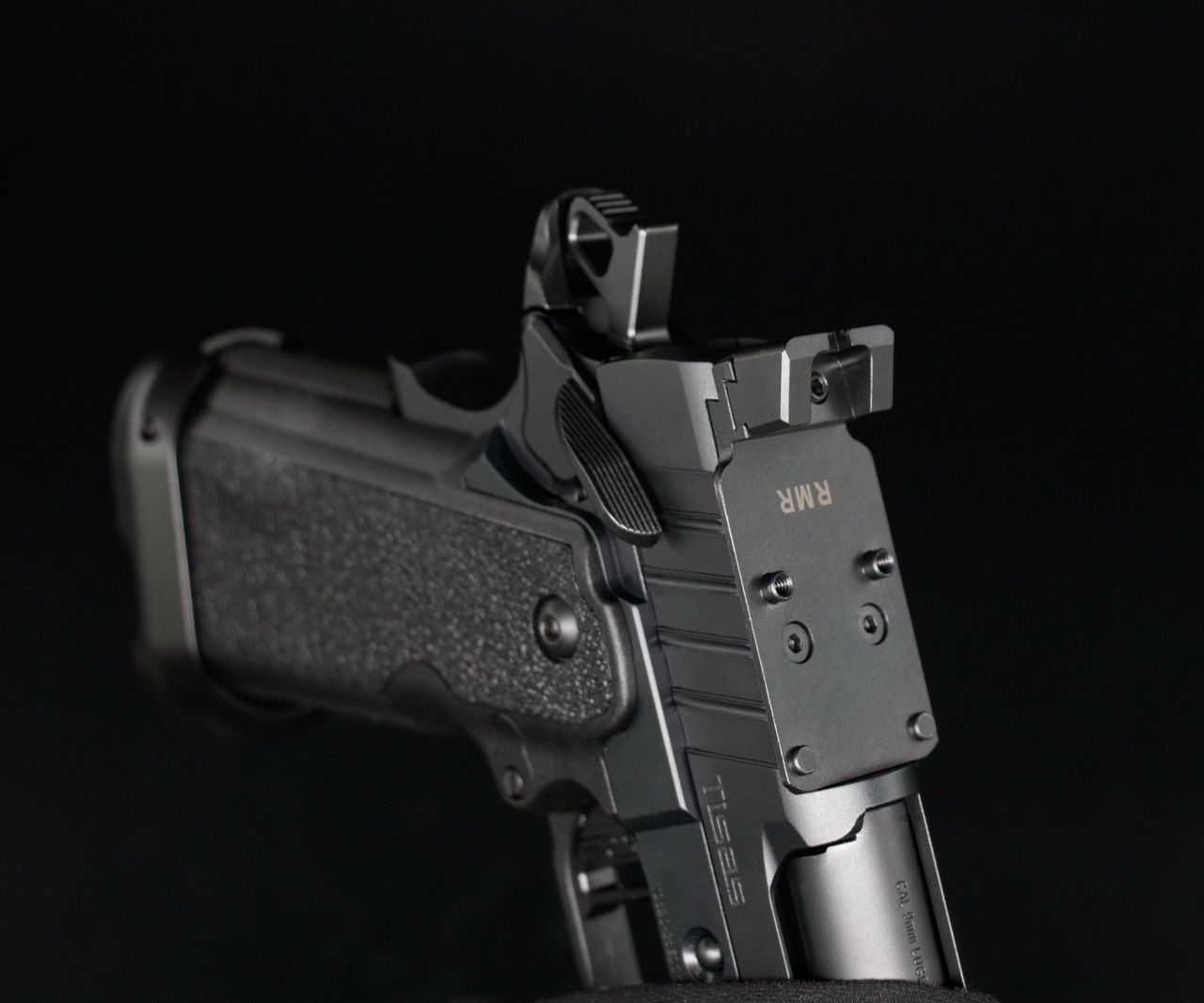 An optic plate seated in the factory cut on a Tisas slide, ready to mount a red dot