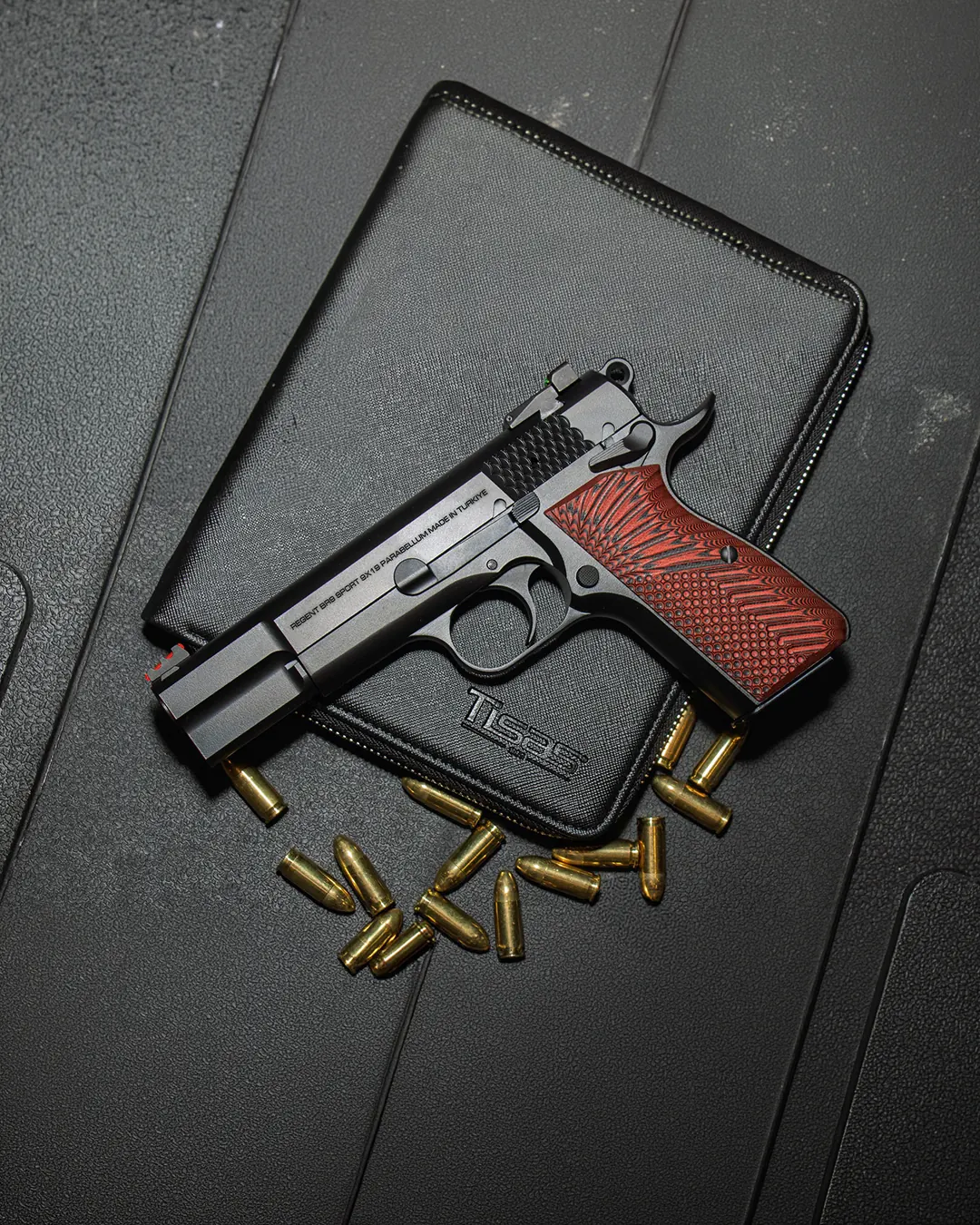 A Tisas Regent BR9 Hi-Power pattern pistol on a factory case