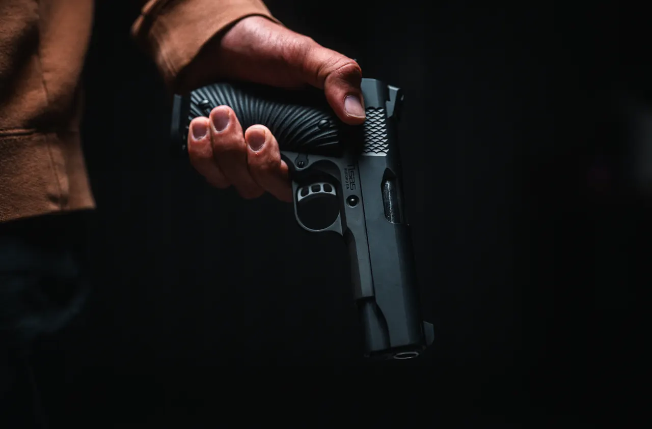 A Tisas forged-steel 1911 in low light