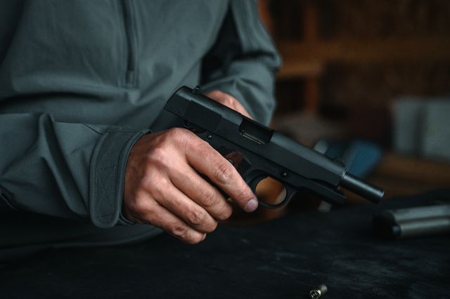 Tisas TC, held in hand at the bench