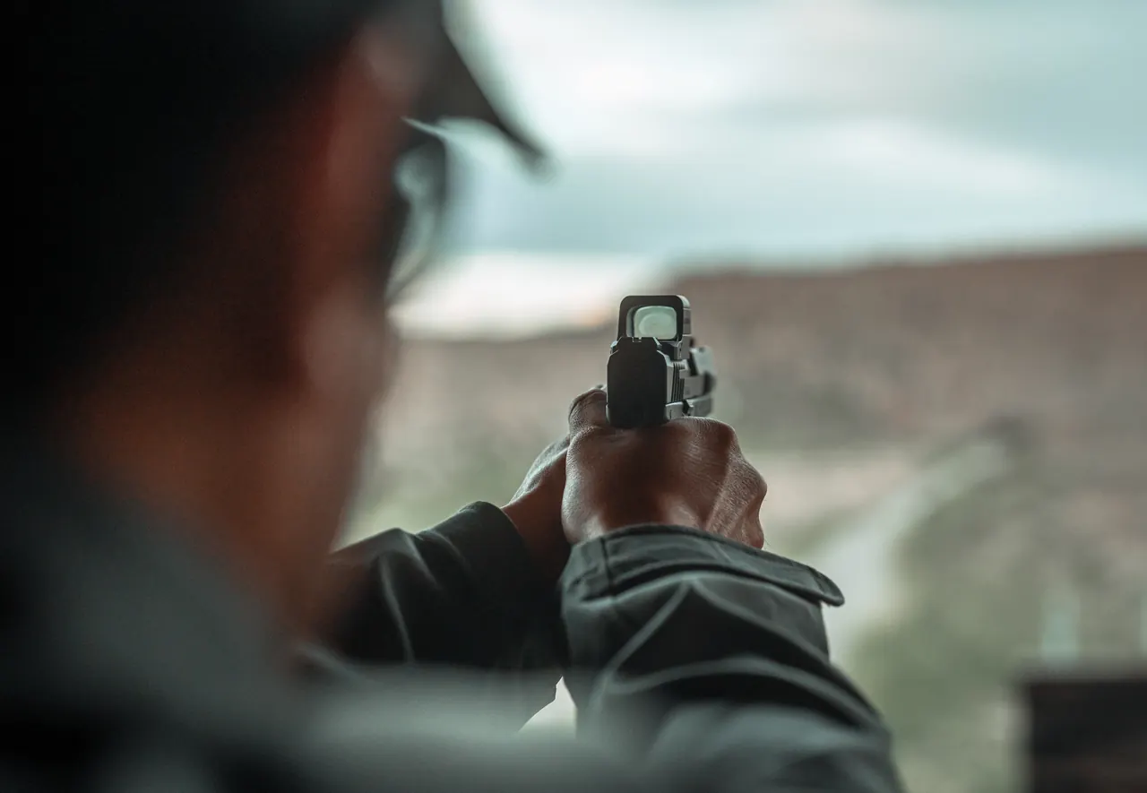 A Tisas PX pistol sighted in with a red dot optic mounted