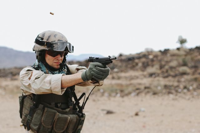 Tisas Duty, firing, brass in the air, helmet and goggles