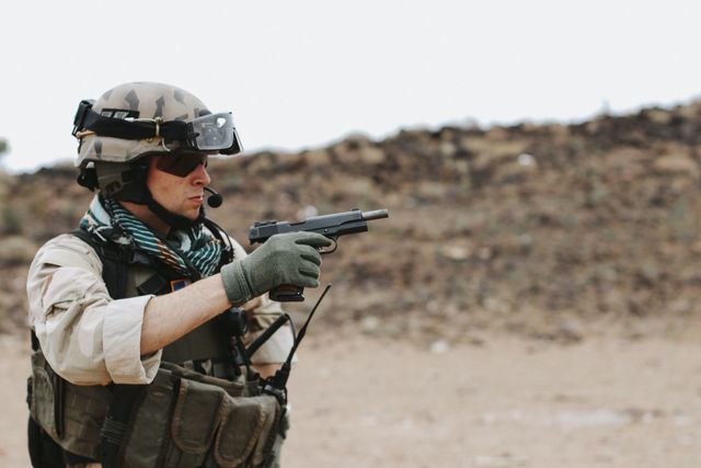Tisas Duty, held at the ready, helmet and goggles