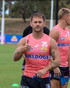 Western Bulldogs Asics 2023 Youth Training Guernsey - Papaya
