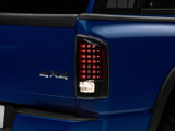 Raxiom 07-08 Dodge RAM 1500 LED Tail Lights- Black Housing (Clear Lens)