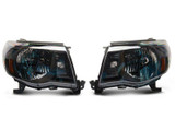 Raxiom 05-11 Toyota Tacoma Axial Series OE Replacement Headlights- Black Housing (Clear Lens)