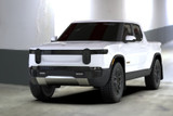 Rally Armor 22-25 Rivian R1T Black UR Mud Flap w/Tangerine Scream Logo