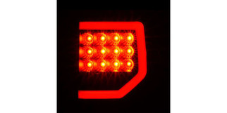 Raxiom 07-13 Toyota Tundra Axial Series Dual C-Shape LED Tail Lights- Black Housing- Clear Lens
