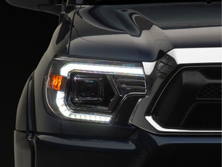 Raxiom 12-15 Toyota Tacoma Axial Series Switchback Projector Headlights- Chrome- Clear Lens
