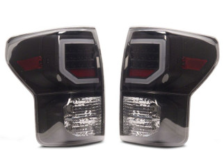 Raxiom 07-13 Toyota Tundra Axial Series Dual C-Shape LED Tail Lights- Black Housing- Smoked Lens