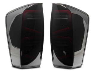 Raxiom 16-23 Toyota Tacoma ST LED Tail Lights- Black Housing- Smoked Lens