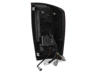Raxiom 16-23 Toyota Tacoma XW Series Sequential LED Tail Lights- Black Housing/ Smoked Lens