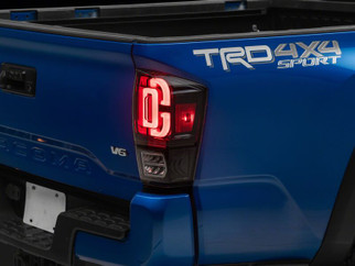 Raxiom 16-23 Toyota Tacoma XW Series Sequential LED Tail Lights- Black Housing- Clear Lens