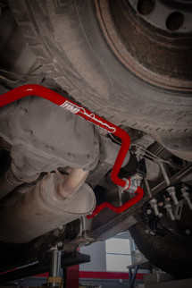 UMI Performance 15-24 Ford F-150 1in Solid Rear Sway Bar - Red