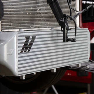 Mishimoto 2023+ Toyota GR Corolla Intercooler & Pipe Kit - Silver Cooler - Red Pipes