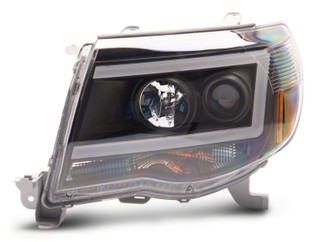 Raxiom 05-11 Toyota Tacoma Axial Series LED DRL Projector Headlights- Black Housing (Clear Lens)