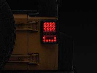Raxiom 07-18 Jeep Wrangler JK Axial Series Lux LED Tail Lights- Black Housing (Clear Lens)