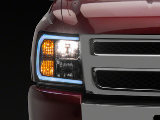 Raxiom 07-13 Chevrolet Silverado 1500 Axial Series Headlights w/ LED Bar- Black Housing (Clear Lens)