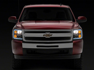 Raxiom 07-13 Chevrolet Silverado 1500 Axial Series Headlights w/ LED Bar- Black Housing (Clear Lens)