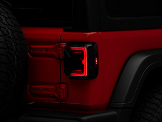 Raxiom 18-23 Jeep Wrangler JL Axial Series LED Tail Lights- Black Housing (Smoked Lens)