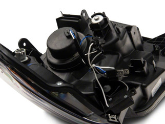 Raxiom 14-21 Toyota Tundra Axial Series Projector Headlights w/ LED Bar- Black Housing (Clear Lens)